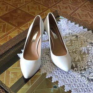 White 2.5 inch heel.